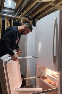 local jacksonville technician fixing fridge door