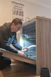 specialist repaired broken dishwasher sprayarm
