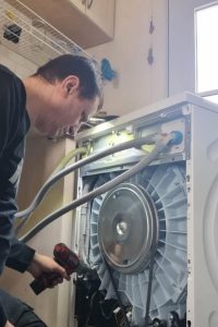 technician repairing washer in jacksonville